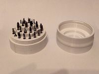 Screwdriver bits threaded container