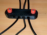 Desk cable organiser (number of slots selectable in OpenSCAD)