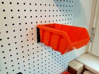 Storage bin pegboard mount