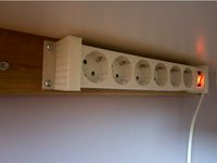 Multi-way extension cord holder