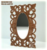 Carved mirror