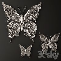 Stucco, butterfly decor.