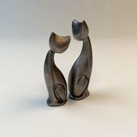 Бронзовые кошки