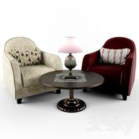 Chairs, a desk lamp and a table