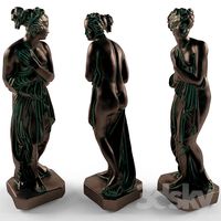 A bronze statue of a woman