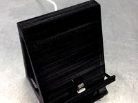 iPhone 5 or iPad Mini Stand with speaker cut out and curved base to amplify sound. by Boardofdenver