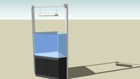 Fishtank on cabinet with light fixture