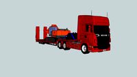 Low loader lorry with digger.