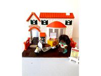 Textured pizzeria toy house by Opossums