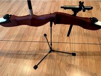 Minimalistic bow stand by Opossums