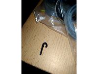 Car charger cable holder clip around car radio or where are tight gaps by harveszter