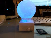 Illuminated rotating sphere stand by ORB84