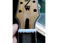 Compensated Shelf Nut for Guitar by wirakocha