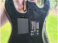 Rock Band Guitar Battery Cover by danielbeaver