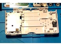 Nintendo DS Lite stylus hole cache by guigro