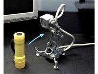 Sci-fi desk spotlight made from cheap flashlight by Juzeg