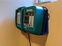 Makita DC18RA Battery Charger Mount by CasperSPT
