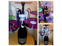 Cupcake Display Stand - made with bottle and CDs by seagull08