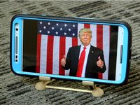 Cell Phone Stand with Skewers by Gazorpa