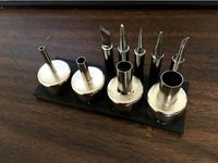 Solder tip and reflow cap holder by jasperpants