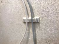 3d printing filament tube wall holder mount by Gronis