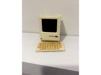 macintosh with keyboard and mouse by Morcurious