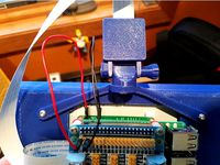 Raspberry Pi 7 inch touch screen v2 camera mount by nsquid78