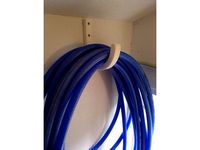Big hook, wall mounted, for hose, extension cord, etc. by Fenixer