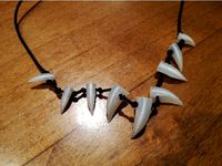 Dinosaur teeth necklace by marcor97