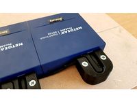 Netgear - Powersupply Holder by kevinvanlieshout