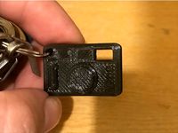 Rangefinder Camera Keychain by Digduck