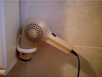 Hair dryer holder, no screws, no duct tape needed by ddchesser