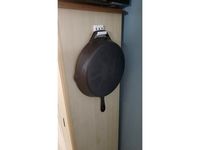 cast iron skillet hanger by thedrunkpenguin