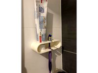 Toothpaste and toothbrush holder by gtlloyd