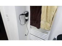 Hair dryer holder by manticus
