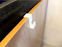 Towel holder for cupboard door by Nageda