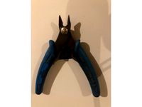 Wall mounted holder for Pliers with hidden screw by sf2ftw