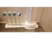 Oral-B toothbrush head stand holder + brAun toothbrush charger holder by Ongelofeloos