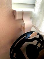 "Dinosaur pull-ups" windowsil headset holder by pezinek