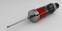 Realistic vintage syringe with red liquid inside