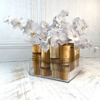 The composition with bamboo and orchids