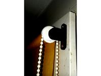 Blinds holder mounted on window by screws. by Scabby