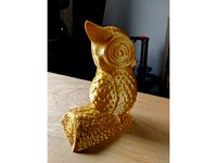Owl bookend on a log by betamax