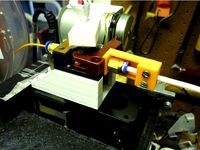 Bowden tube fixing by robberet