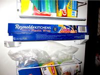 Adjustable Plastic Wrap Pantry Door Shelf by Iceytee
