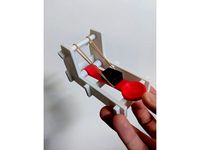 Better rubber band holder for toy catapult by chambm