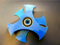 Lazy Susan horizontal spool holder for cake tin drybox by MarvinPound