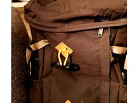 Bike helmet holder for backpack by Flying_Ginger