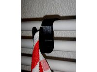 Simple towel hook for a bathroom heater by berniku