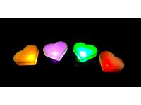 Glowing sugar hearts by Horror-